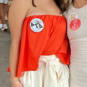 Orange strapless top